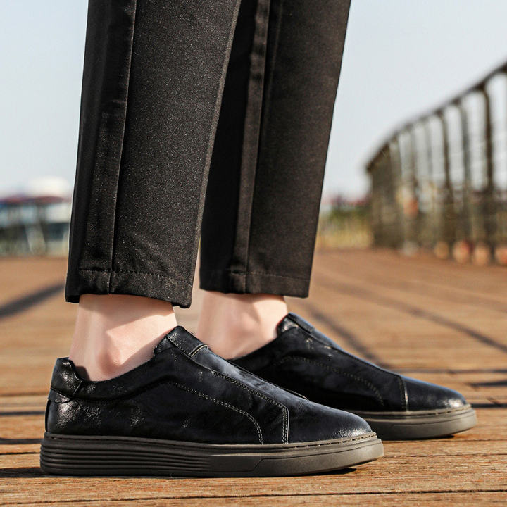 Elegant black mens hand-finished sneakers. Stylish & comfortable versatile footwear.