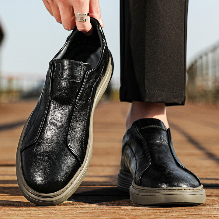 Black men's stylish everyday sneakers. Hand-finished, comfortable low-top design.