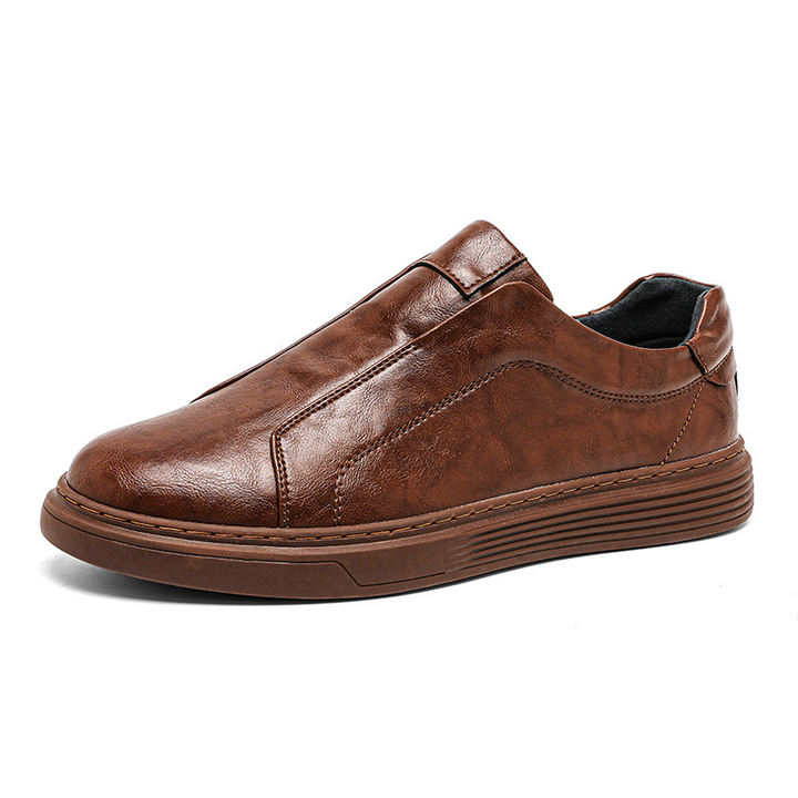Stylish black mens hand-finished low-top sneakers. Versatile for dress & casual.