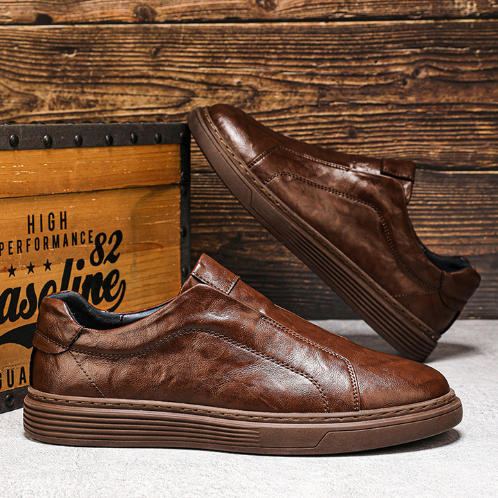 Stylish black mens footwear, hand-finished dress sneakers for versatile styling.