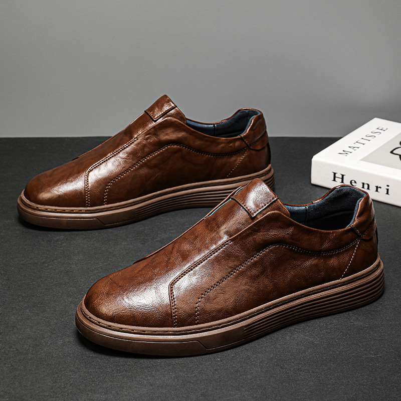 Men's everyday white low-top sneakers. Classic comfortable footwear for casual style.