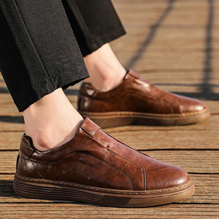 Hand-finished black men's sneakers. Stylish & comfortable everyday dress shoes.