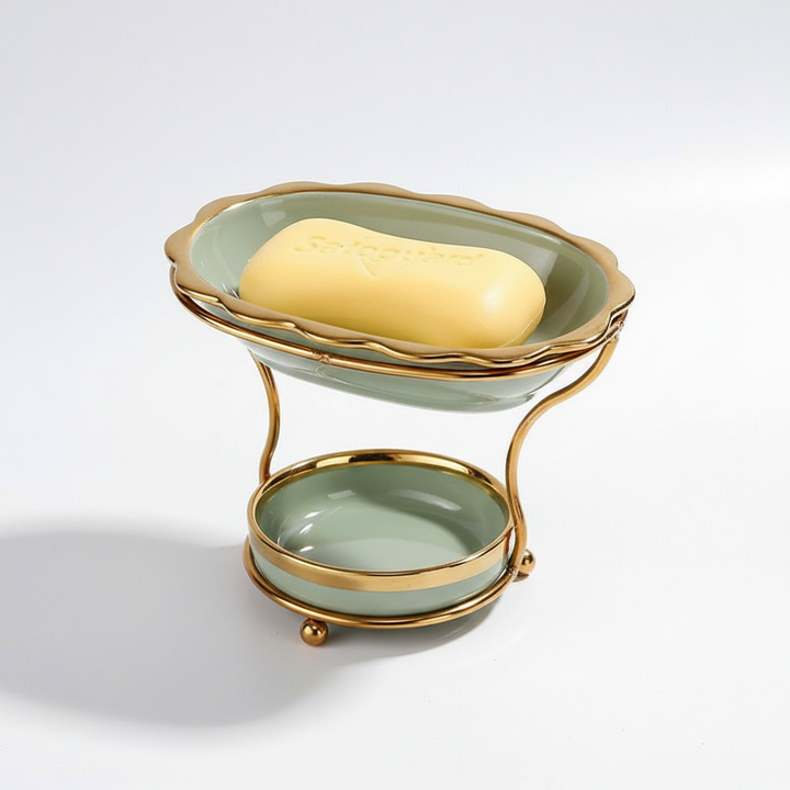 Stylish white porcelain soap holder, elevated for quick drying on any bathroom countertop.