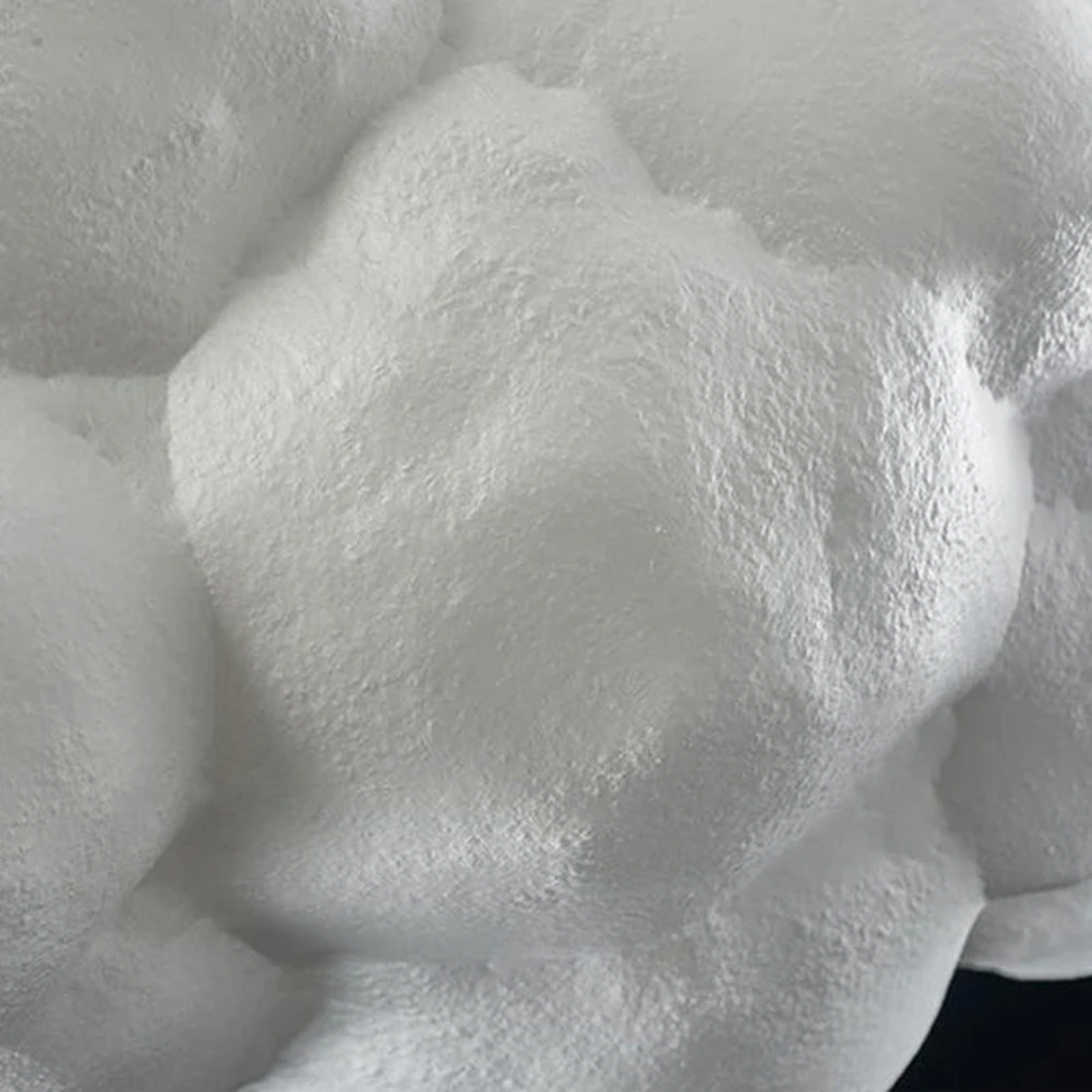 Unique cloud-shaped LED pendant light, white PVC & cotton, adds modern decor to any room.