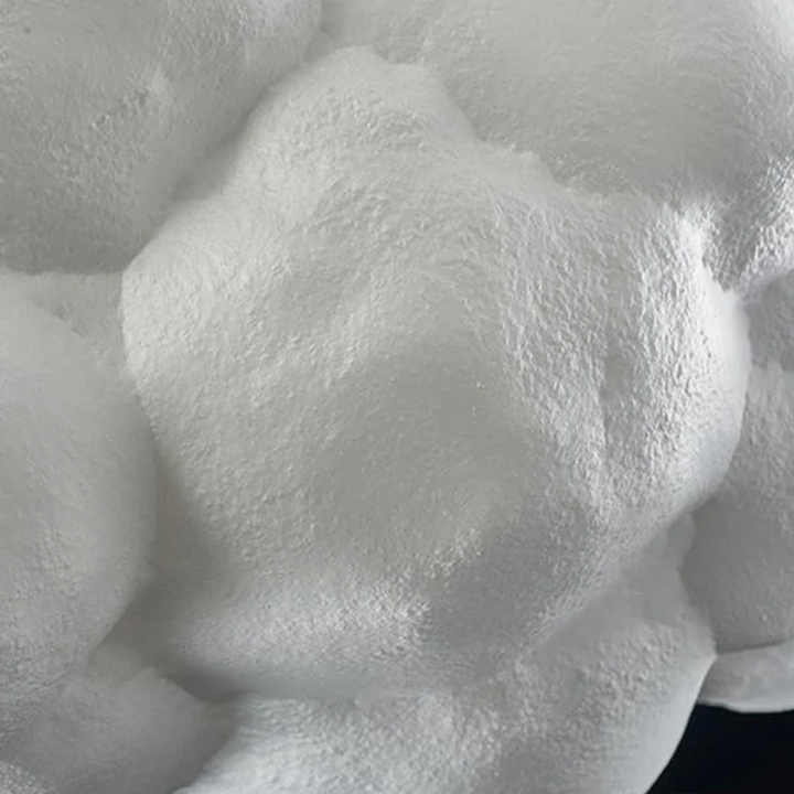 Unique cloud-shaped LED pendant light, white PVC & cotton, adds modern decor to any room.