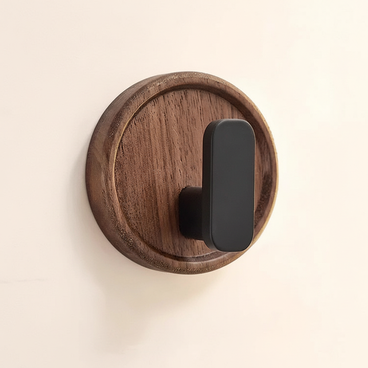 Close-up of a self-adhesive wall hook, perfect for easy, drill-free kitchen or bathroom organization
