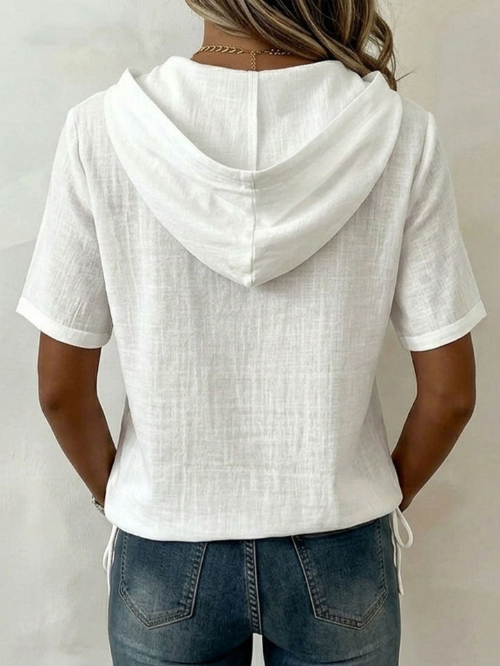 Pink women's relaxed fit hooded shirt, a versatile long sleeve casual top for spring & summer fashion.