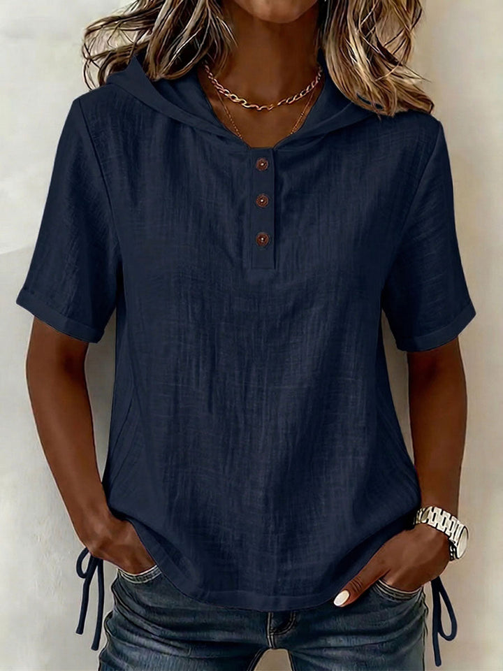Close-up of a women's casual hooded shirt, showcasing its relaxed fit and versatile everyday style.
