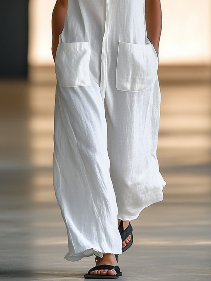 Chic white wide-leg jumpsuit, sleeveless & retro. A comfortable one-piece for women's summer casual or vacation wear.
