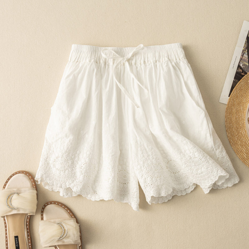 White women's lightweight drawstring shorts with delicate lace trim, perfect for summer casual wear & vacation.