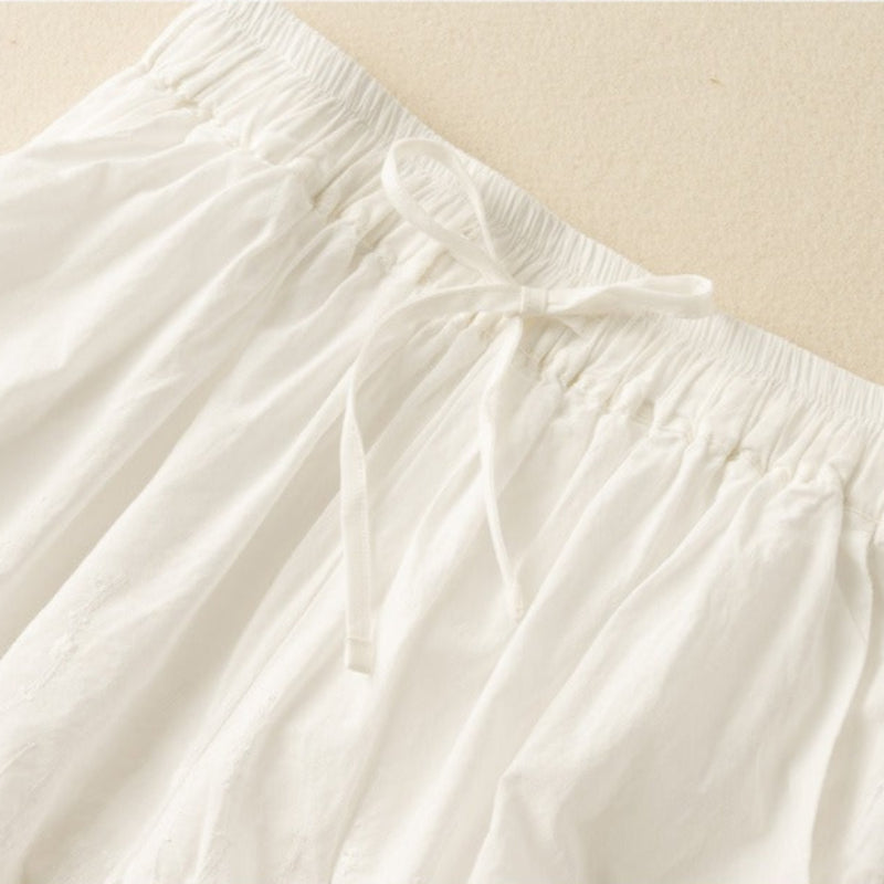 Lightweight women's drawstring shorts with stylish lace trim for a relaxed, comfortable summer look.