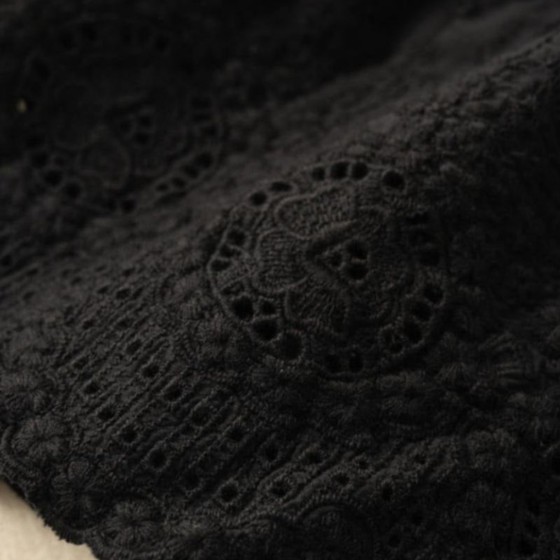 Soft women's drawstring shorts featuring intricate lace trim along the hem, ideal for warm weather comfort.