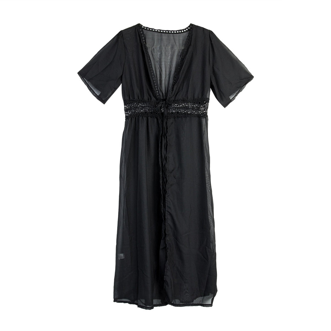 White long women's summer dress with elegant lace trim, a comfortable flowy silhouette, and a chic bow tie back.