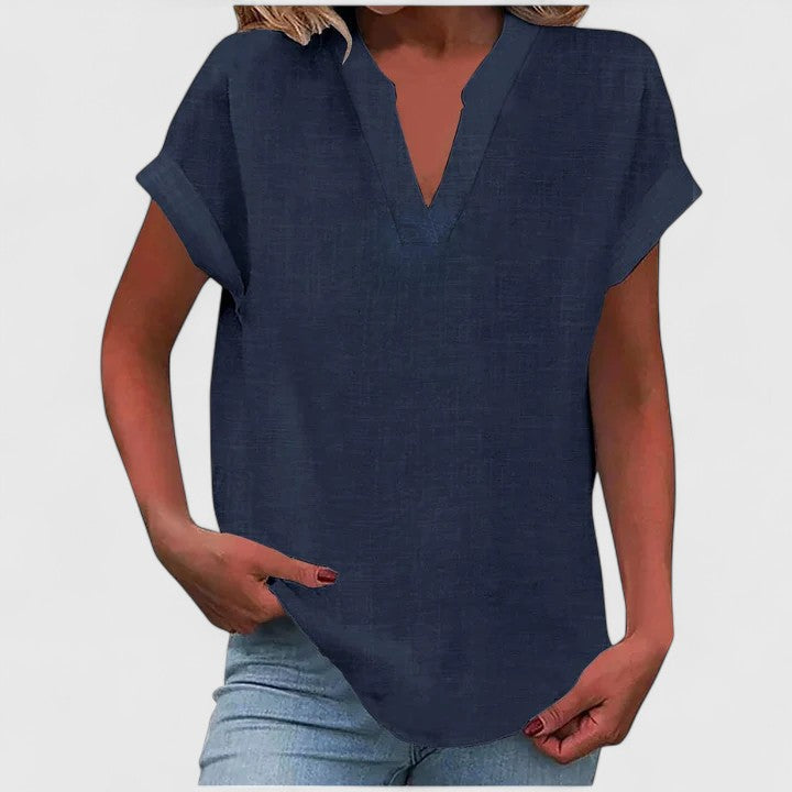 Trendy Peach V-Neck Top, a flowy women's blouse with cap sleeves, ideal for relaxed style.