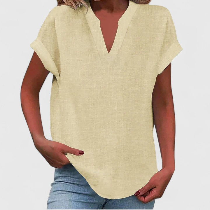 Smart Casual White V-Neck Blouse, a loose fit top for women, perfect for office or leisure.