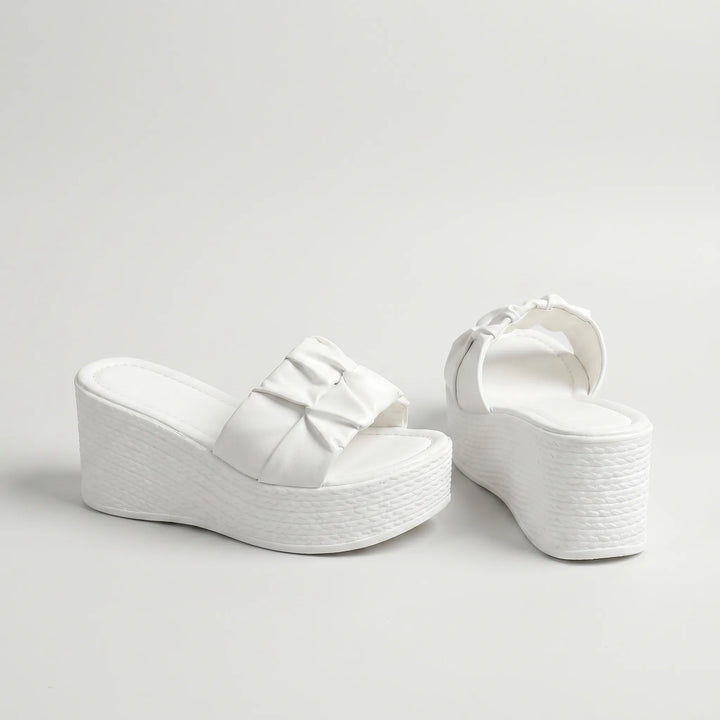 Easy-wear women's platform wedge sandals in white with a comfortable slip-on design, ideal for casual summer fashion.