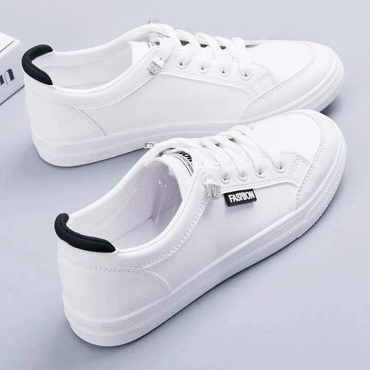 Chic UrbanEase Low women's tennis sneakers, designed for ultimate comfort with orthopedic support & lace-up style.