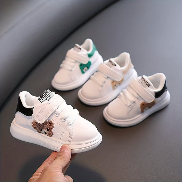 WildCub toddler active sneakers for playful adventures; easy slip-on Velcro closure, durable kids shoes.