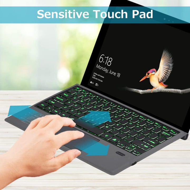 Ergonomic wireless Bluetooth keyboard with large touchpad, designed for Surface Pro