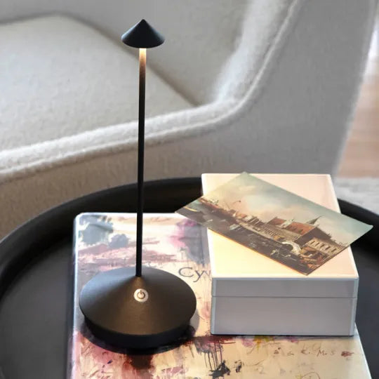 Contemporary LED table lamp, provides dimmable wireless lighting for home decor