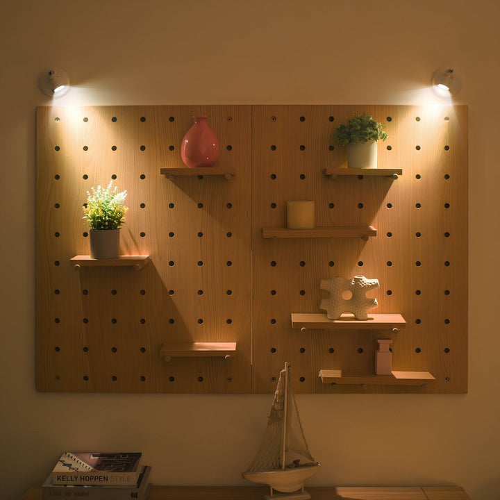 Compact LumaSpot wireless LED accent light, USB rechargeable, showcasing its sleek design.