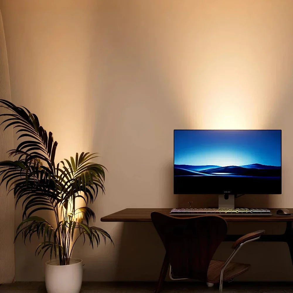 Close-up of LumaSpot wireless LED spotlight showing its controls for dimming and color.