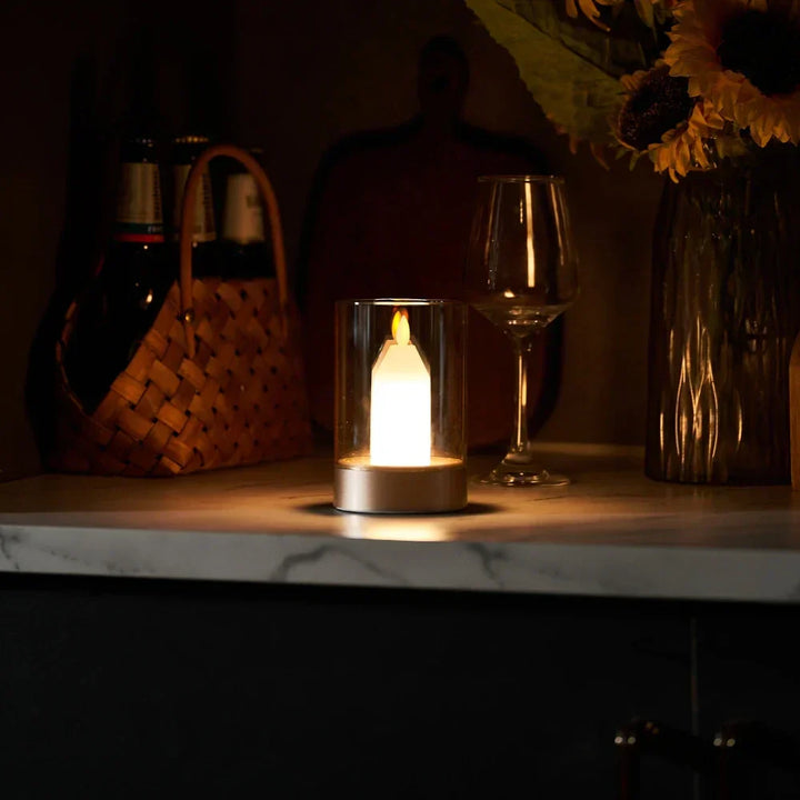 Warm light glow from a wireless LED candle lamp, perfect for relaxation and mood setting