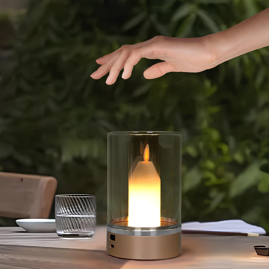 Hand demonstrating gesture control feature on a modern LED candle lamp