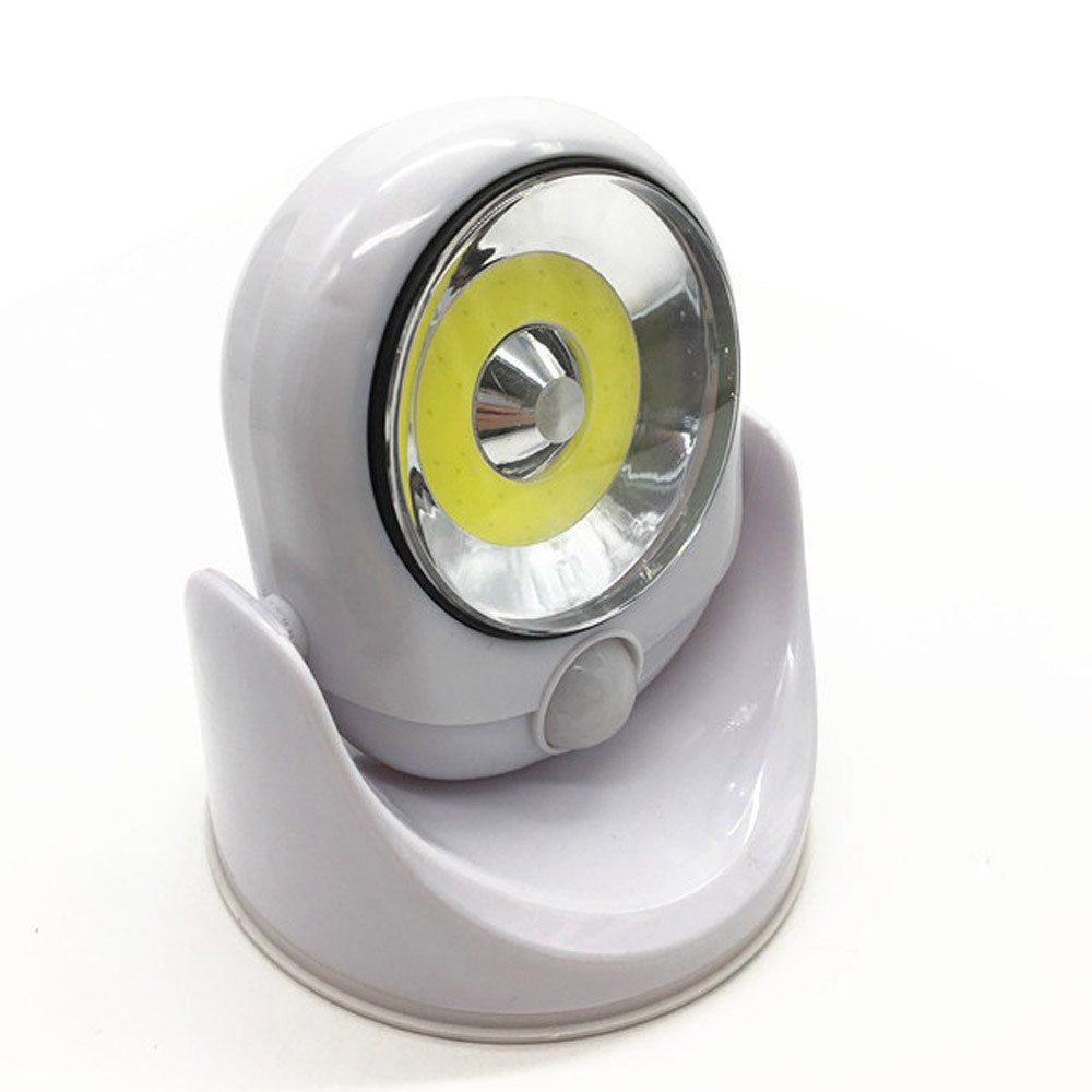 Battery-operated wireless LED light with motion sensor. Provides enhanced home safety & bright illumination.