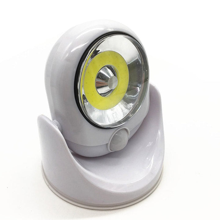 Battery-operated wireless LED light with motion sensor. Provides enhanced home safety & bright illumination.
