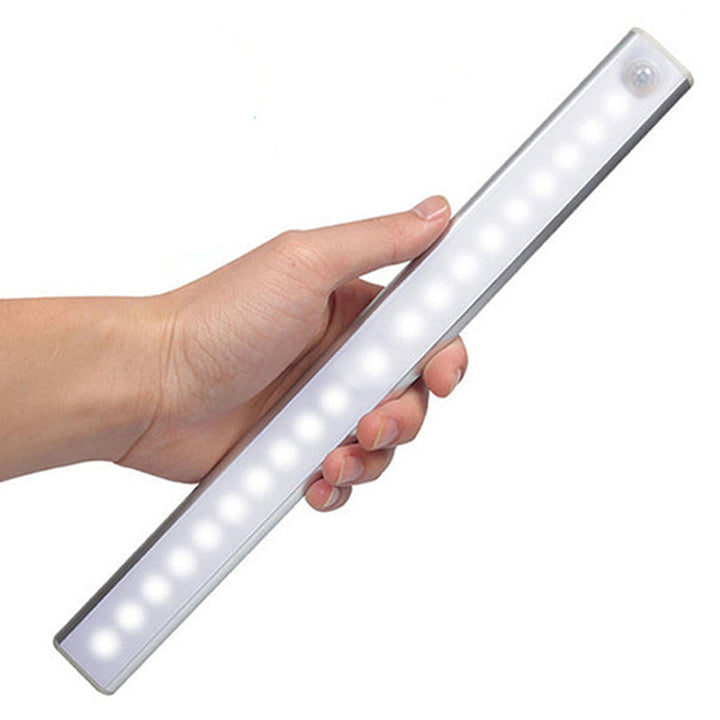 Wireless LED night light with motion sensor for stairs, closets. Rechargeable, energy-efficient smart home lighting.