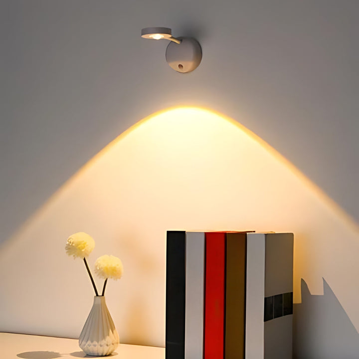 Adjustable wireless LED spotlight with motion sensor, USB-C rechargeable, touch & remote controlled.