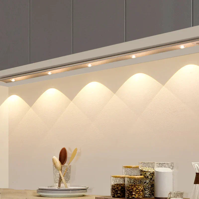 Compact wireless LED light with adjustable brightness, suitable for pantries and workshops