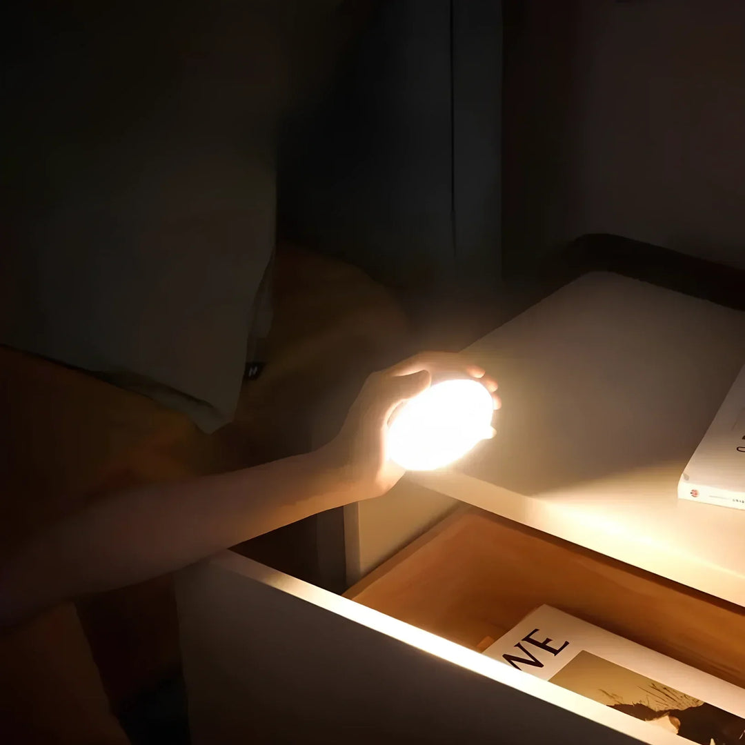 Compact wireless motion sensor light with energy-efficient LEDs, suitable for any home interior