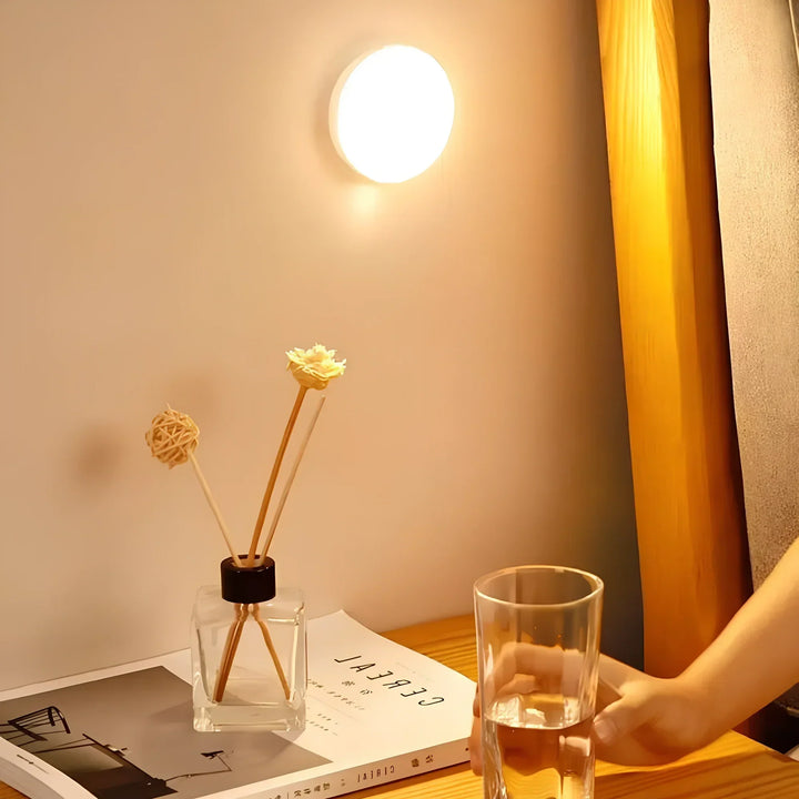 Modern LED motion sensor light, wireless and USB rechargeable, enhances home security and lighting