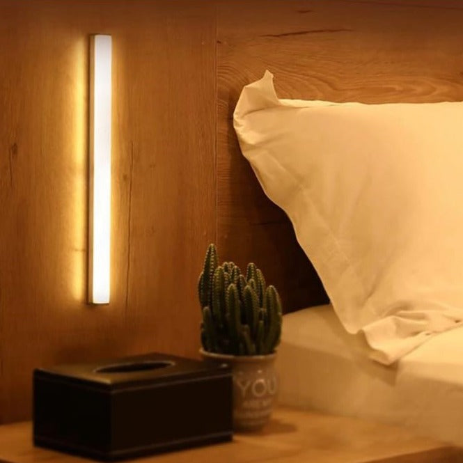 Sleek, wireless LED night light with motion detection, designed for easy installation in cabinets and wardrobes.