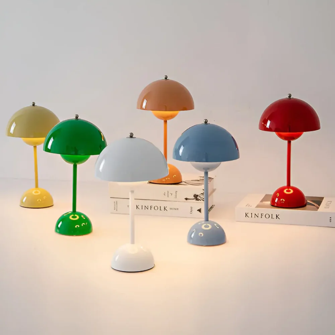 Portable wireless LED lamp demonstrating its compact size and easy-to-use adjustable light control.