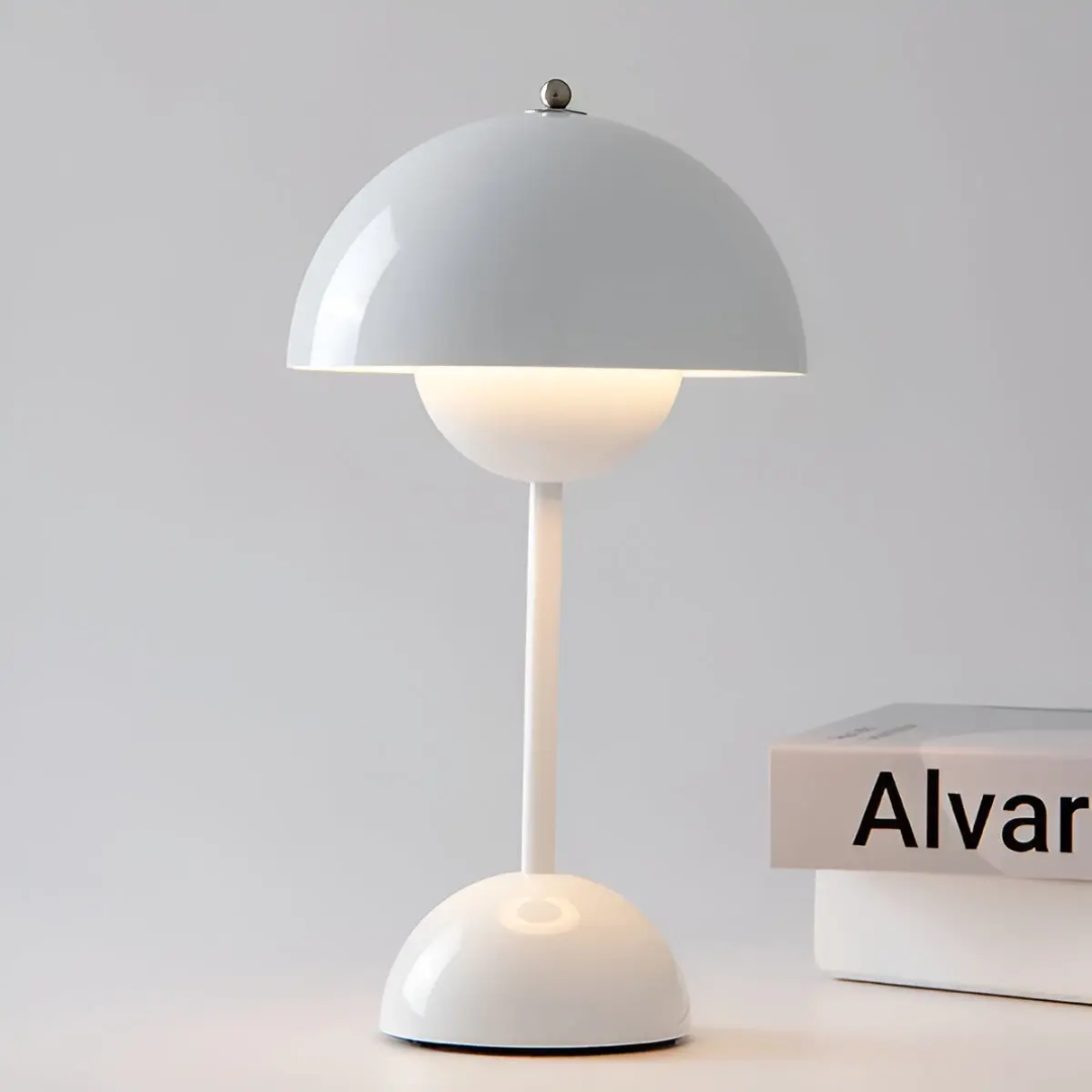 Contemporary wireless table lamp, LED, providing soft, adjustable ambient light for relaxation.