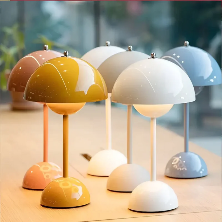 LED portable table lamp with long-lasting rechargeable battery for indoor/outdoor use.