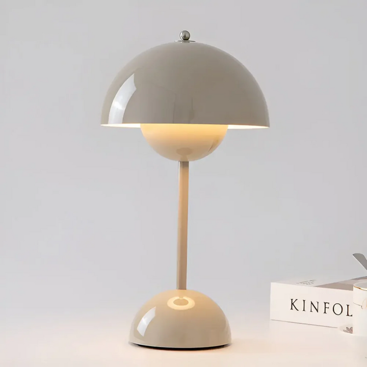 Top-down view of the wireless table lamp, highlighting its refined design and LED light output.