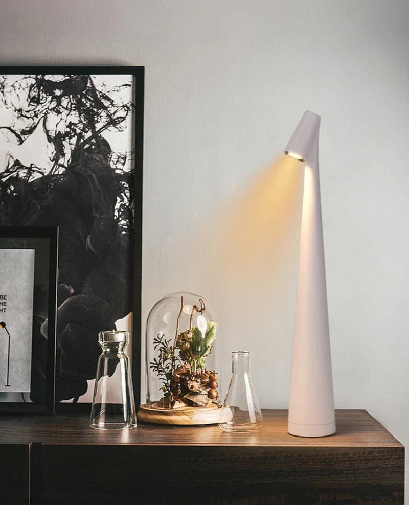 Modern wireless table lamp LunaLite, perfect for ambient bedroom or living room lighting.