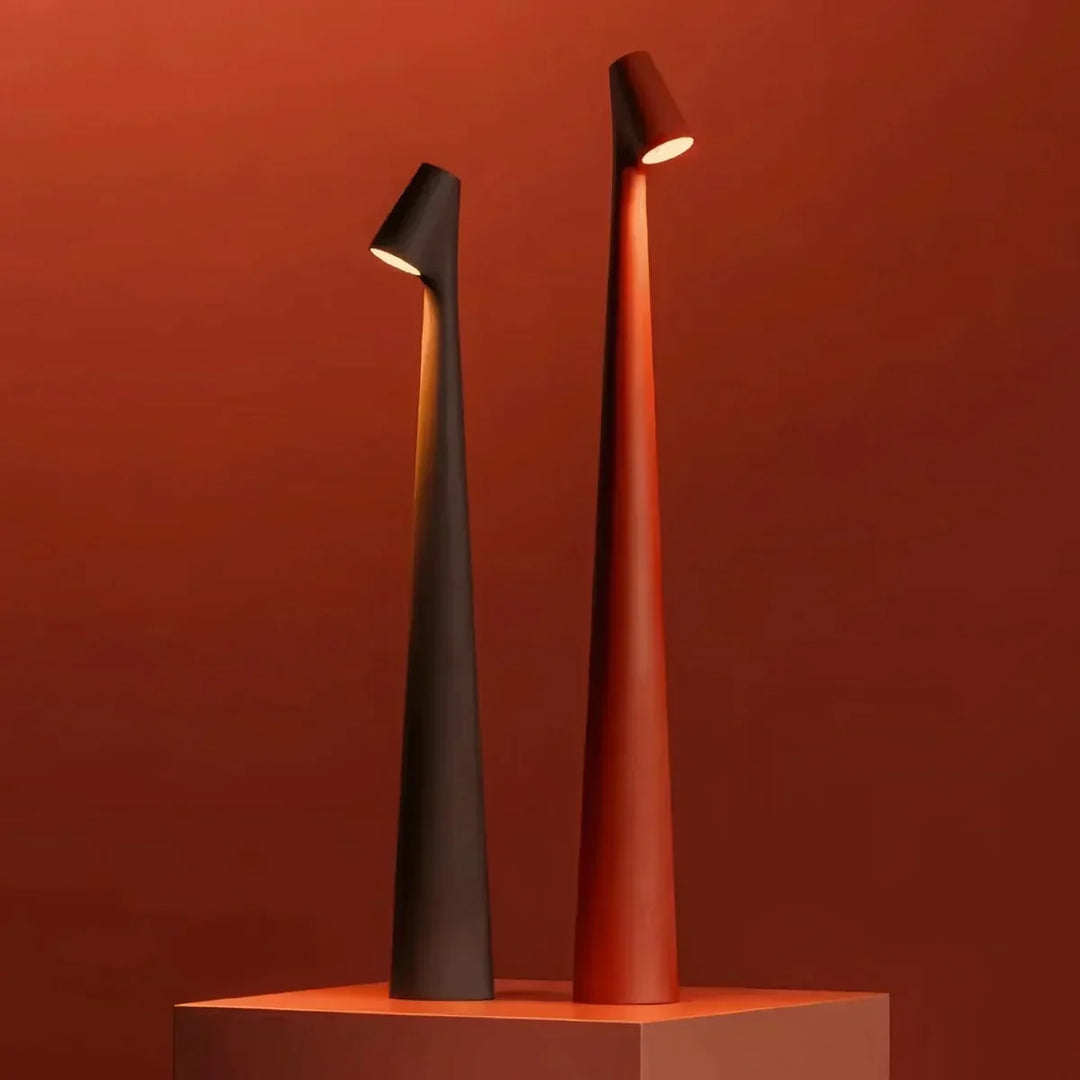 Versatile portable table lamp with soft ambient lighting for indoor & outdoor use.