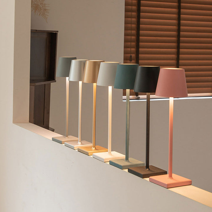 Portable cordless dimmable lamp for indoor or outdoor use, ideal for ambient lighting.