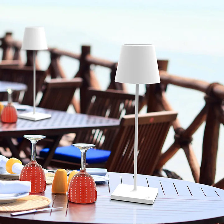 Modern wireless table lamp with LED dimming, offering portable, warm ambient light.