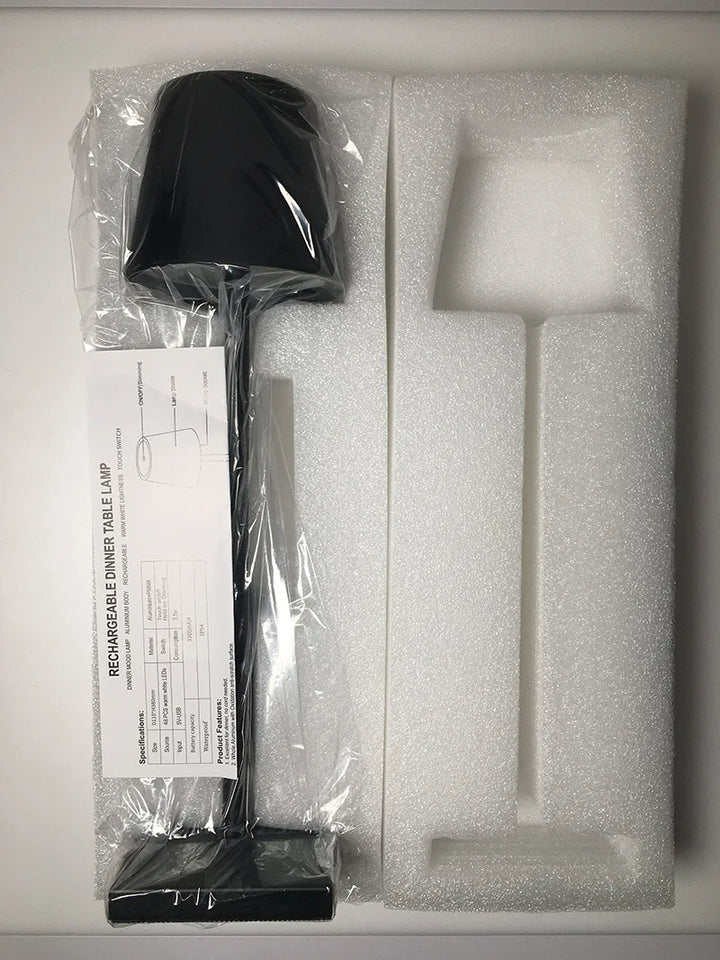 Cordless rechargeable ambiance lamp, versatile for home decor or outdoor lighting.
