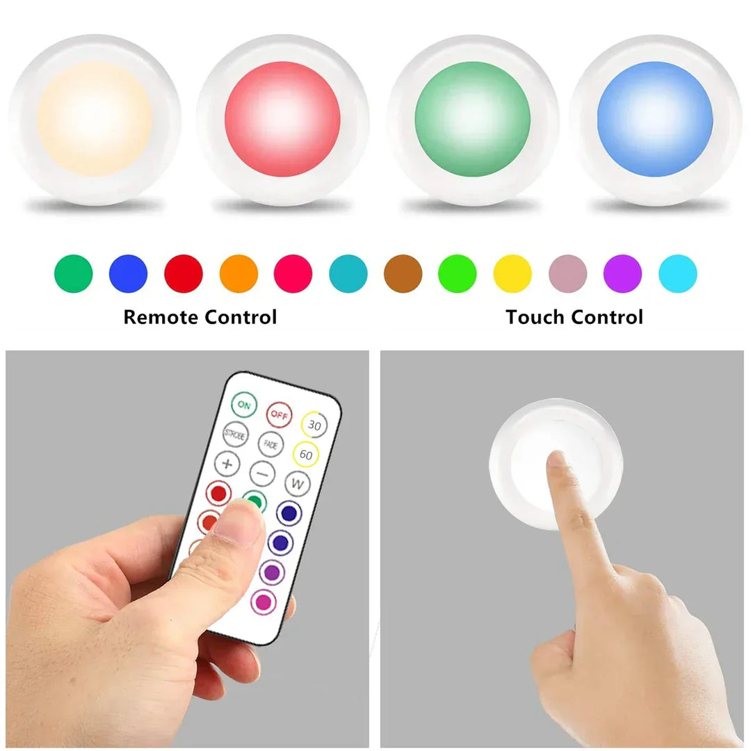 Remote controlled RGB LED under cabinet lighting, wireless & battery-powered for kitchen decor.