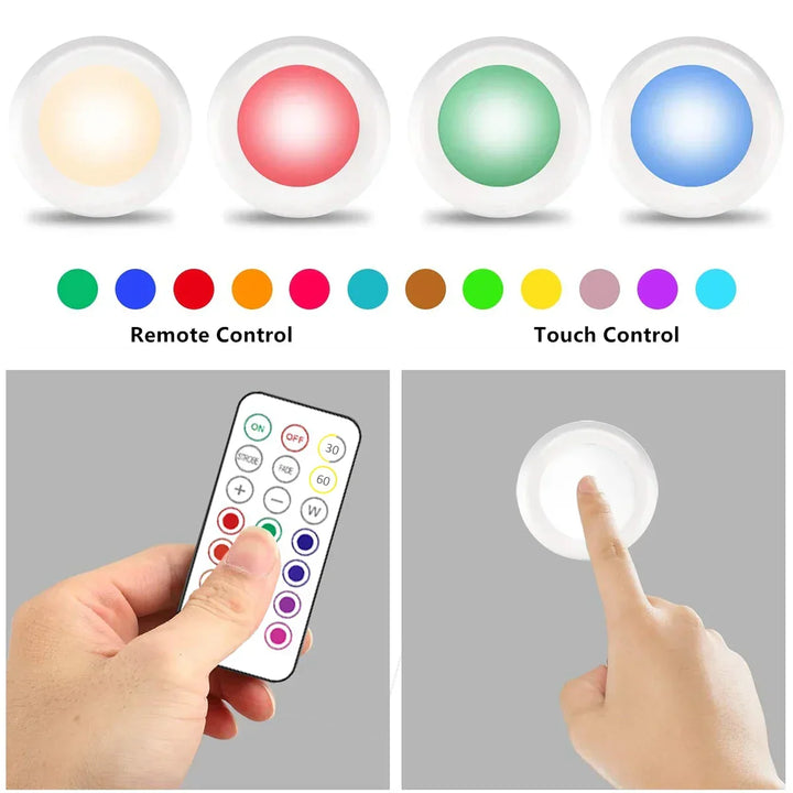 Remote controlled RGB LED under cabinet lighting, wireless & battery-powered for kitchen decor.