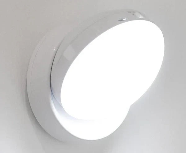 Wireless smart motion sensor LED night light, automatic illumination for home safety.