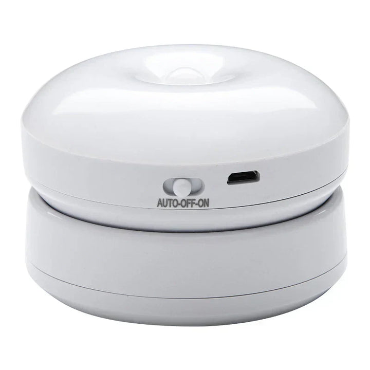 Battery-operated LED night light with smart motion sensor for energy-saving indoor lighting.