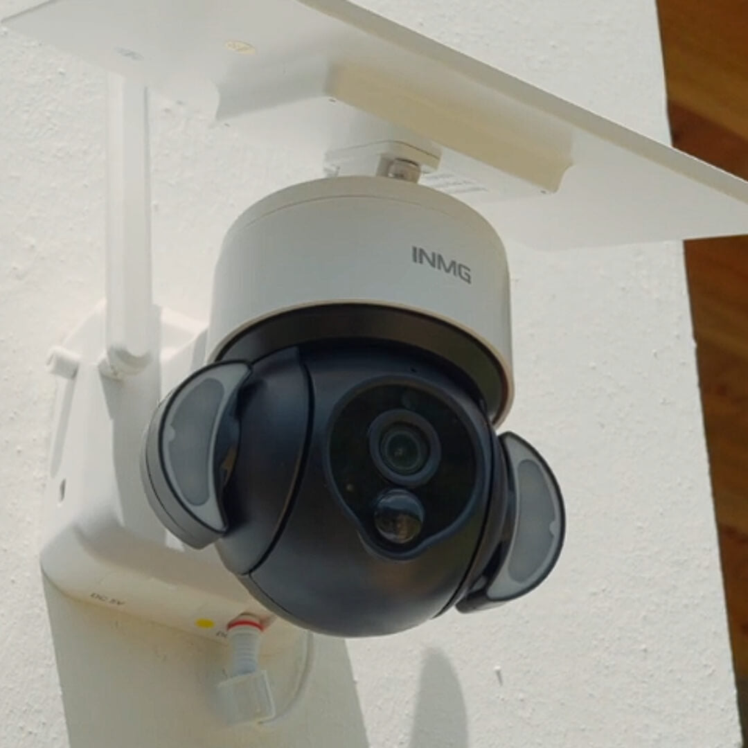 Wireless solar security camera with rotating dome for outdoor home surveillance and protection.